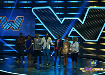 All contestants on stage with Uti Nwachukwu Host