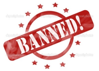 A red ink weathered roughed up circle and stars stamp design with the word BANNED! on it making a great concept.