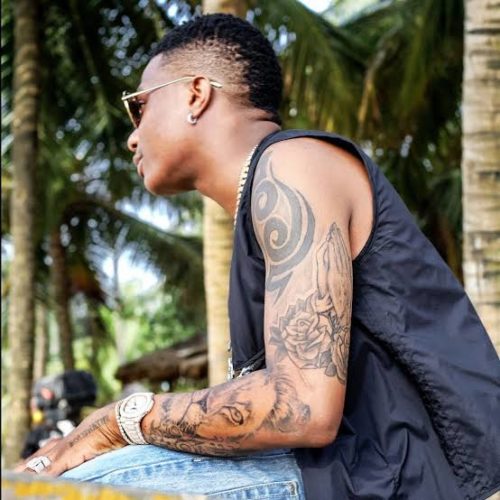 Wizkid Draws Hilarious Tattoo On His Body After Earning Millions From