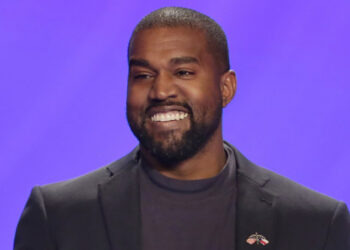 FILE - In this Nov. 17, 2019, file photo, Kanye West appears on stage during a service at Lakewood Church in Houston. West is scheduled to unveil his 10th studio album, â€œDonda,â€ named after his late mother, at a listening party Thursday, July 22, 2021, at Mercedes Benz Stadium in Atlanta. (AP Photo/Michael Wyke, File)