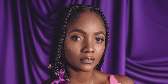 E Choke! Simi’s New Song, ‘Woman’ Appears On Times Square Billboard 1