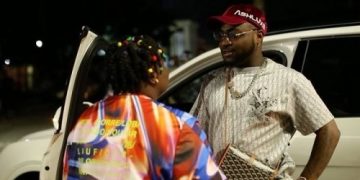 “Imagine say she fall” – Fans React to Old Video of Teni Chasing Davido’s Car [WATCH]