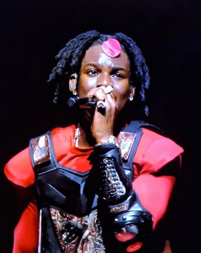 “She Was The First Queen Mother In Benin” – Fan Defends Rema On His Demonic Mask Display at 02 Arena