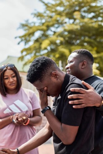 Tearful Woman Kneels Before Moses Bliss in Kenya Amidst Emotional Moment 2 Gospel artiste Moses Bliss surprises mentees with new cars 2