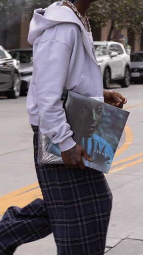 Rema Spotted with Sade's Promise Vinyl