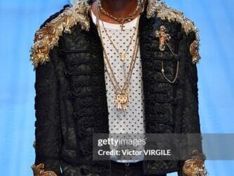MILAN, ITALY - JUNE 16: Wizkid walks the runway at the Dolce & Gabbana show during Milan Men's Fashion Week Spring/Summer 2019 on June 16, 2018 in Milan, Italy. (Photo by Victor VIRGILE/Gamma-Rapho via Getty Images)