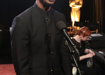 HOLLYWOOD, CALIFORNIA - MARCH 15: In this handout photo provided by The Academy, Michael B. Jordan reacts backstage with the Actor in a Leading Role award for "Sinners" during the 98th Oscars at Dolby Theatre on March 15, 2026 in Hollywood, California. (Photo by Al Seib / The Academy via Getty Images)